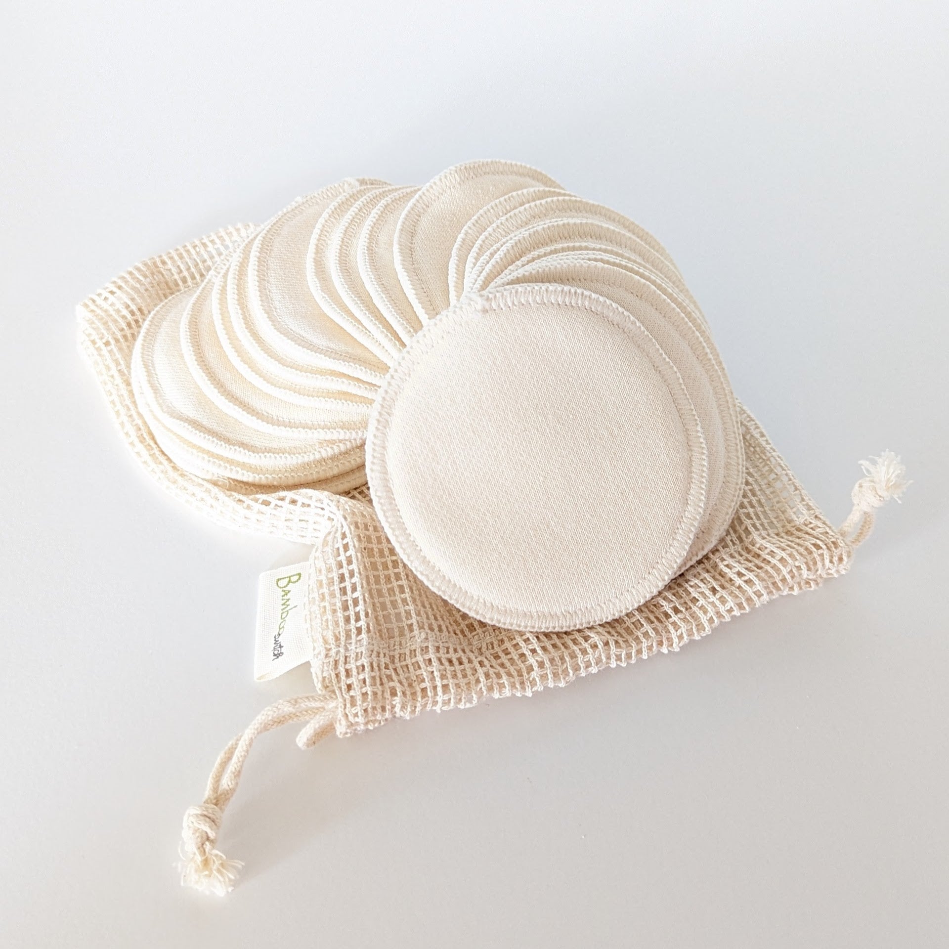 round hemp makeup pads on a mesh bag