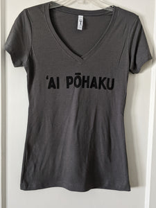 Soft lightweight dark gray women's tee with 'AI PŌHAKU in black ink on the chest , displayed on a hanger